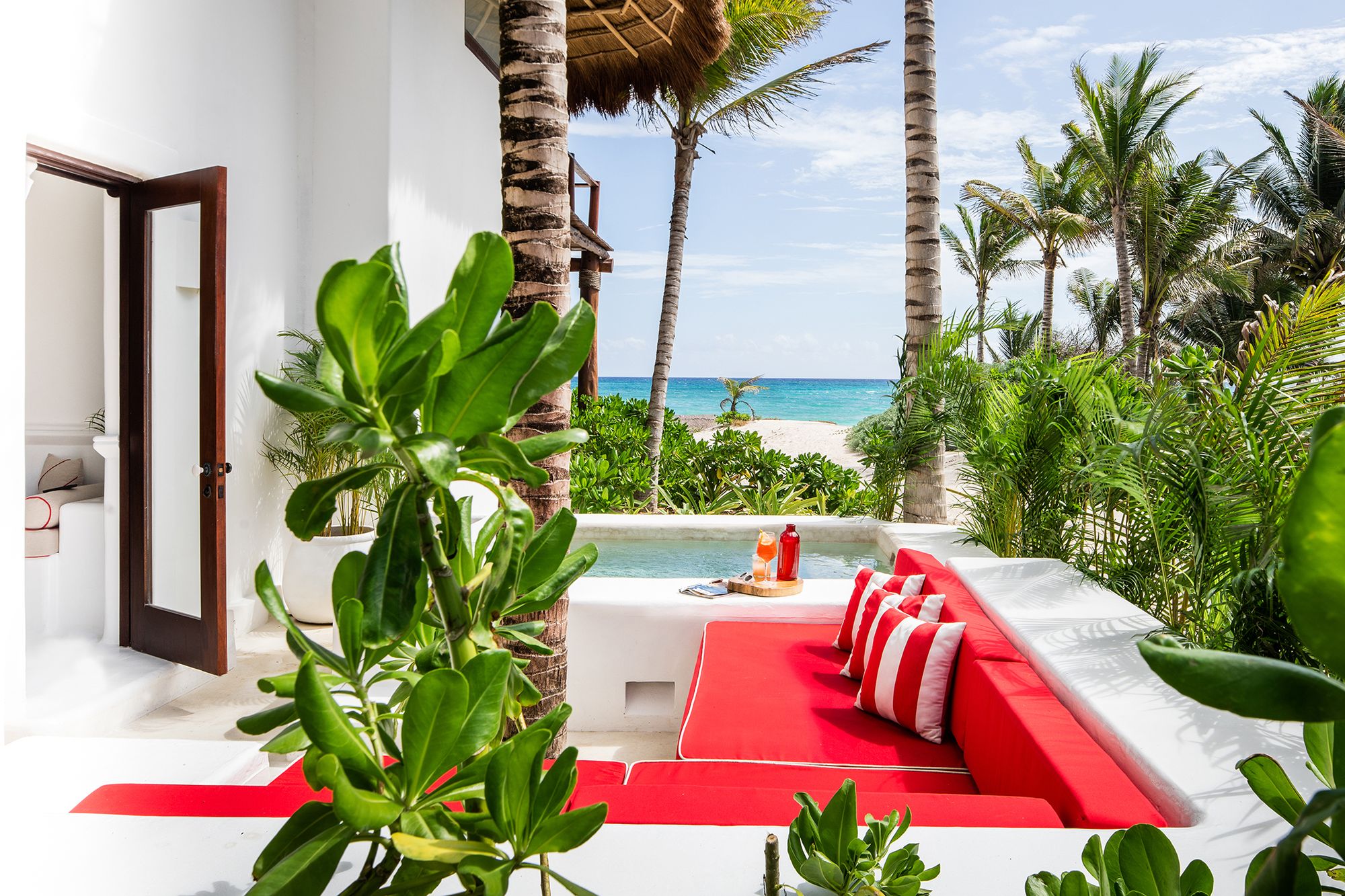 Terrace of a Master Beach Suite opening onto the beach at Hotel Esencia