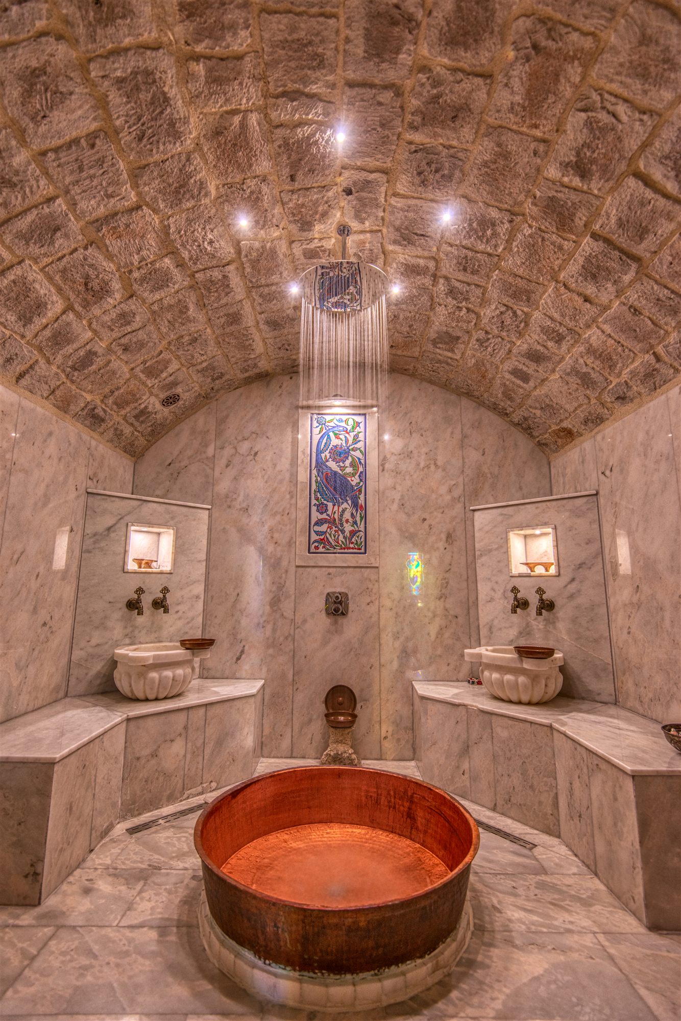 Domed stone Turkish hamam with a copper basin at Museum Hotel, Cappadocia