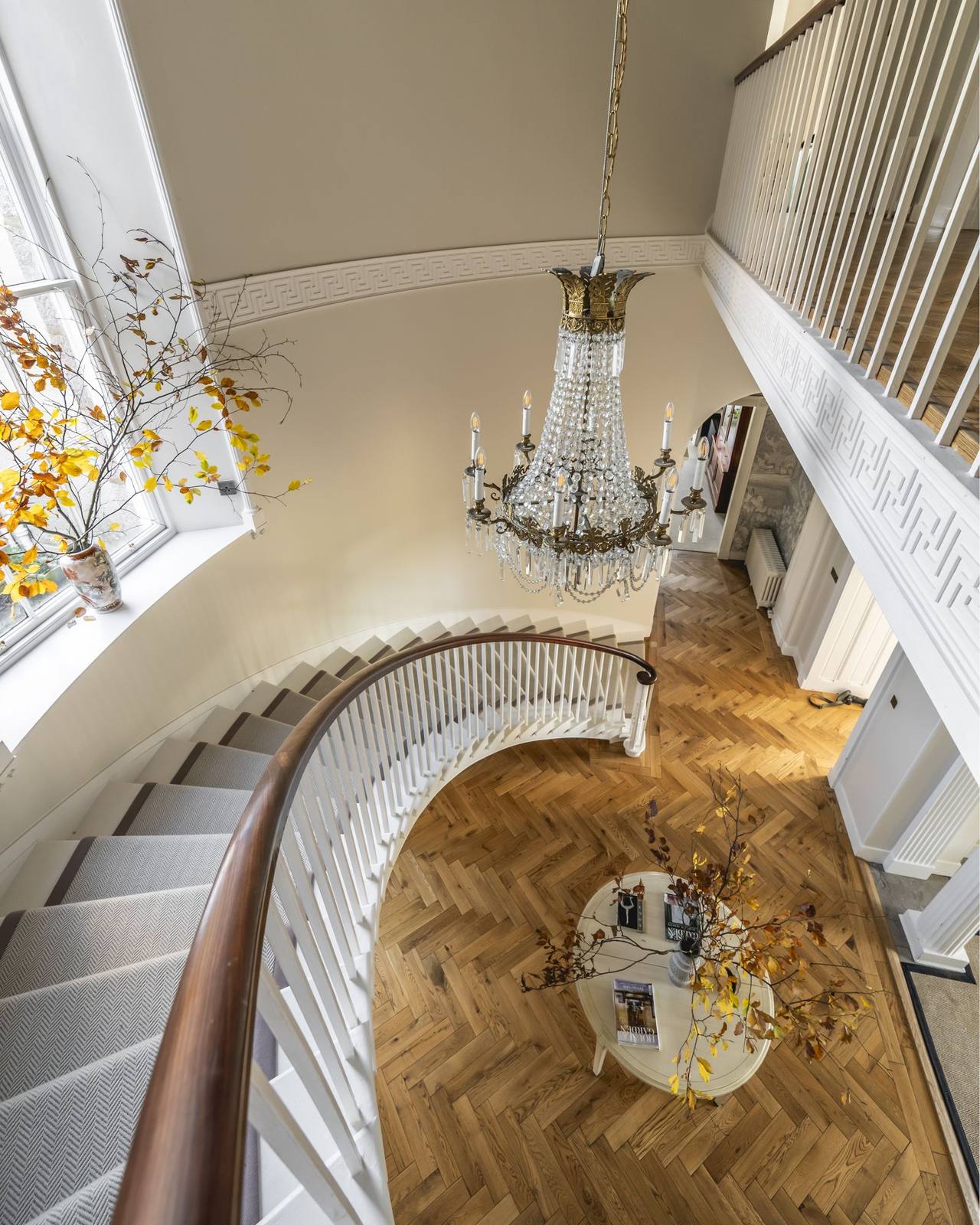 Looking down Manar's curving staircase to the hall below