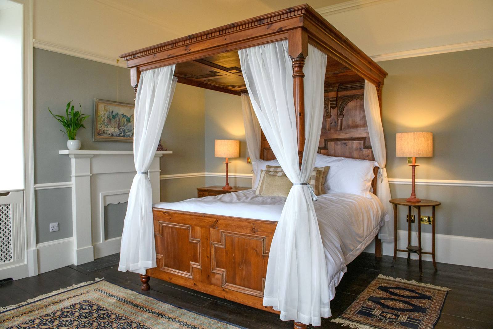 A four-poster bedroom at House of the Northern Gate