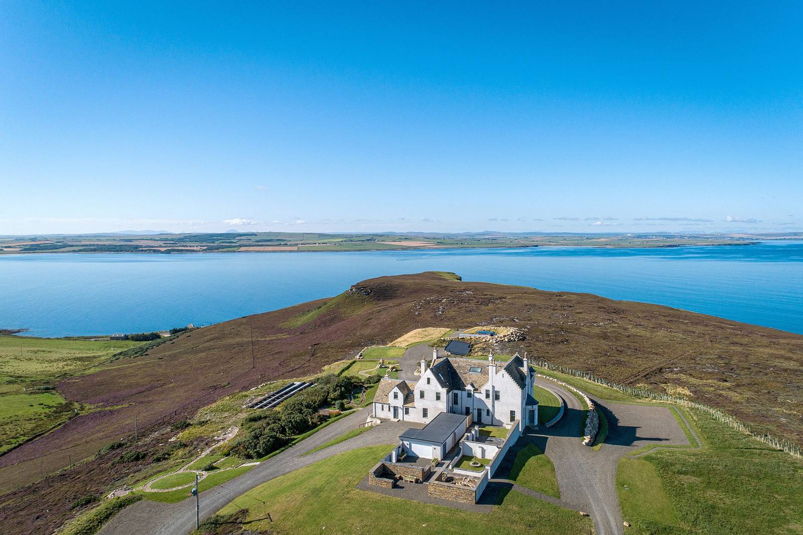 House of the Northern Gate from the air, Dunnet Bay beyond
